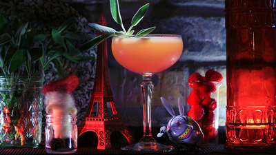 Craft cocktail with assorted decor