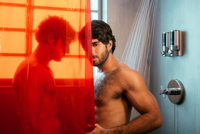 Two men in shower.