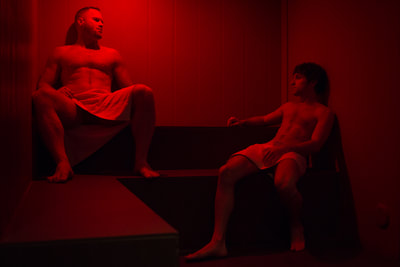 Two men in the sauna.